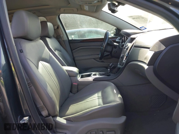 2012 Cadillac SRX Luxury Collection with VIN 3GYFNAE37CS640833, listed as a IAAI auction lot 41745208 with 153,711 mi miles and . Bid and sale history available at carsss.com. Image 5.