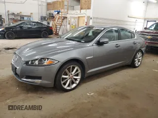 2015 Jaguar XF Portfolio with VIN SAJWJ0FF8F8U65883, listed as a Copart auction lot 55783945 with 133,431 mi miles and Salvage Title. Bid and sale history available at DreamBid. Image 1.