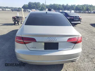2017 Audi A8 with VIN WAU44AFD3HN014802, listed as a IAAI auction lot 42573537 with 121,096 mi miles and . Bid and sale history available at DreamBid. Image 16.