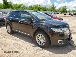 2015 Lincoln MKX z VIN 2LMDJ8JK1FBL31836, wystawiony jako Copart lot #56241005 z przebiegiem 128 613 mil mil oraz Szkoda całkowita • Salvage title. Historia ofert i sprzedaży dostępna na DreamBid. Obrazek 4.