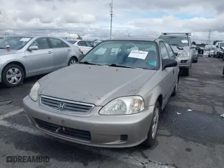 2000 Honda Civic DX with VIN 1HGEJ6625YL058339, listed as a IAAI auction lot 41521835 with 120,282 mi miles. Bid and sale history available at carsss.com. Image 2.
