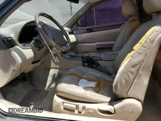 1994 Lexus SC 400 z VIN JT8UZ30C7R0037254, wystawiony jako Copart lot #57633215 z przebiegiem 196 214 mil mil oraz Szkody całkowita. Historia ofert i sprzedaży dostępna na DreamBid. Obrazek 7.