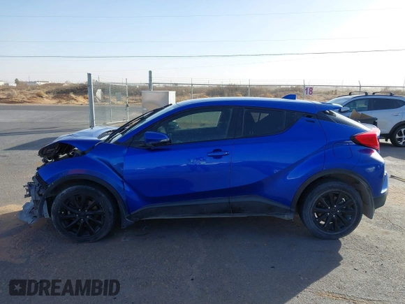 2019 Toyota C-HR XLE with VIN NMTKHMBX3KR098510, listed as a IAAI auction lot 41289899 with 112,981 mi miles. Bid and sale history available at carsss.com. Image 15.