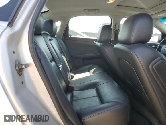 2012 Chevrolet Impala LTZ with VIN 2G1WC5E37C1291499, listed as a Copart auction lot 50063664 with 173,454 mi miles and Salvage Title. Bid and sale history available at DreamBid. Image 10.