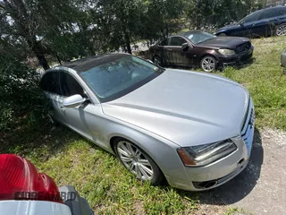 2012 Audi A8 z VIN WAURVAFDXCN038350, wystawiony jako Copart lot #58412285 z przebiegiem 126 372 mil mil oraz Czysty tytuł • Clean title. Historia ofert i sprzedaży dostępna na DreamBid. Obrazek 1.