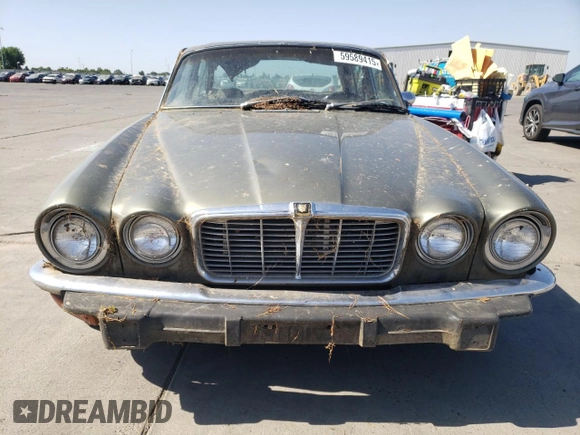 1974 Jaguar XJ with VIN UE2T52398, listed as a Copart auction lot 59589415 with 93,740 mi miles and Clean title. Bid and sale history available at DreamBid. Image 5.