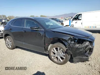 2023 Mazda CX-30 S Carbon Edition with VIN 3MVDMBCM8PM567157, listed as a Copart auction lot 46954865 with 20,038 mi miles and Salvage Title. Bid and sale history available at DreamBid. Image 4.