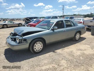 2005 Mercury Grand Marquis GS with VIN 2MEFM74W15X663557, listed as a Copart auction lot 65799904 with 107,483 mi miles and Salvage Title. Bid and sale history available at carsss.com. Image 1.
