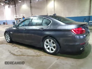 2013 BMW 5 Series 550i xDrive with VIN WBAFU9C57DDY71564, listed as a Copart auction lot 48030035 with 115,040 mi miles and Clean Title. Bid and sale history available at carsss.com. Image 2.