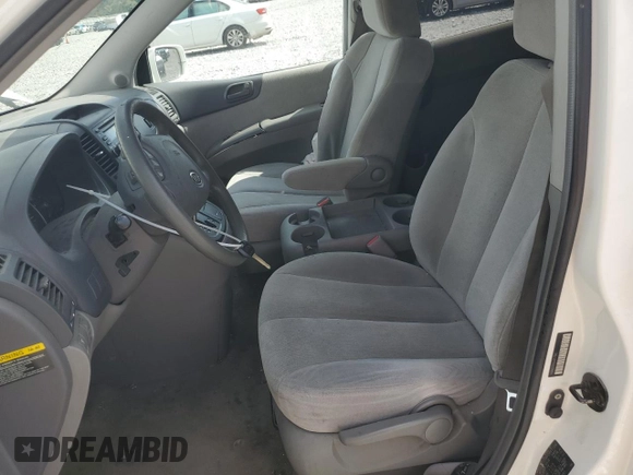 2006 Kia Sedona LX with VIN KNDMB233666057581, listed as a Copart auction lot 71027674 with 206,556 mi miles and Salvage Title. Bid and sale history available at carsss.com. Image 7.