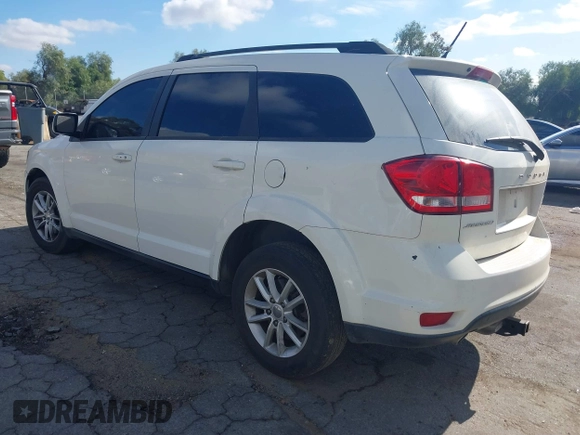2014 Dodge Journey SXT with VIN 3C4PDCBG5ET126637, listed as a IAAI auction lot 41499125 with 165,107 mi miles. Bid and sale history available at carsss.com. Image 3.