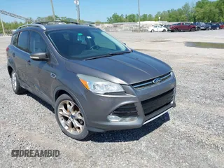 2014 Ford Escape Titanium z VIN 1FMCU0J9XEUA53301, wystawiony jako IAAI lot #42150021 z przebiegiem 117 896 mil mil oraz . Historia ofert i sprzedaży dostępna na DreamBid. Obrazek 1.