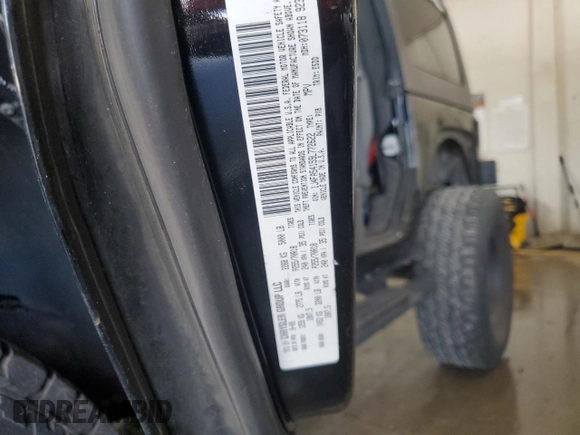 2009 Jeep Wrangler Sahara with VIN 1J4FA54159L772622, listed as a Copart auction lot 55648305 with 141,880 mi miles and Salvage title. Bid and sale history available at DreamBid. Image 12.