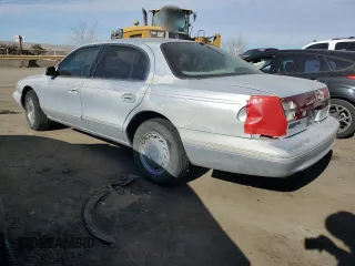 1996 Lincoln Continental z VIN 1LNLM97V3TY627803, wystawiony jako Copart lot #87036654 z przebiegiem 118 078 mil mil oraz Szkoda całkowita • Salvage title. Historia ofert i sprzedaży dostępna na DreamBid. Obrazek 2.