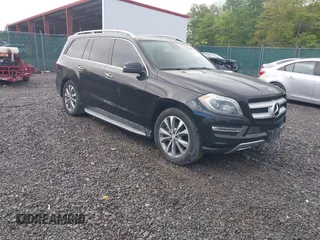 2014 Mercedes-Benz GL 450 z VIN 4JGDF7CE6EA270377, wystawiony jako IAAI lot #42241820 z przebiegiem 136 219 mil mil oraz . Historia ofert i sprzedaży dostępna na DreamBid. Obrazek 1.