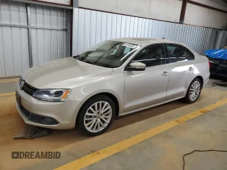 2014 Volkswagen Jetta TDI w/Premium with VIN 3VWLL7AJ9EM261908, listed as a Copart auction lot 60703205 with 128,892 mi miles and Salvage title. Bid and sale history available at DreamBid. Image 1.