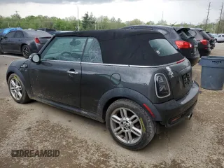 2014 MINI Convertible S with VIN WMWZP3C53ET298154, listed as a Copart auction lot 53971615 with 85,499 mi miles and Salvage title. Bid and sale history available at DreamBid. Image 2.