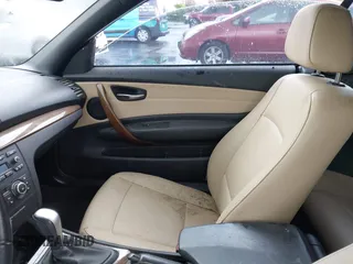 2010 BMW 1 Series 128i with VIN WBAUL7C58AVJ77695, listed as a IAAI auction lot 41938031 with Not Provided miles and . Bid and sale history available at carsss.com. Image 5.