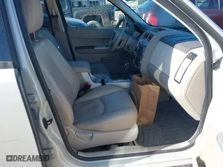 2008 Mercury Mariner Premier with VIN 4M2CU87118KJ39000, listed as a IAAI auction lot 41828500 with 126,226 mi miles. Bid and sale history available at carsss.com. Image 5.