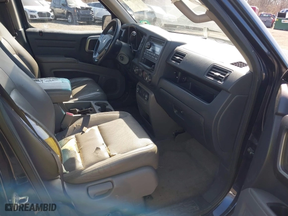 2011 Honda Ridgeline RTL with VIN 5FPYK1F51BB011686, listed as a IAAI auction lot 41790303 with 110,648 mi miles. Bid and sale history available at carsss.com. Image 5.