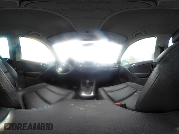 2013 Volkswagen Tiguan SE with VIN WVGAV7AX9DW547633, listed as a IAAI auction lot 42009704 with 51,826 mi miles and . Bid and sale history available at DreamBid. Image 18.