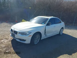 2014 BMW 3 Series 328i xDrive with VIN WBA3B5C59EP540292, listed as a IAAI auction lot 41761916 with 170,819 mi miles. Bid and sale history available at carsss.com. Image 2.