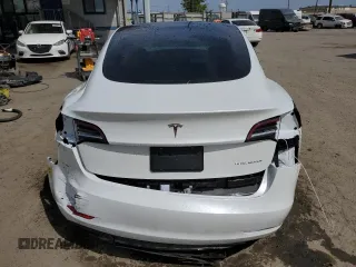 2022 Tesla Model 3 Long Range z VIN 5YJ3E1EB3NF174314, wystawiony jako Copart lot #52713325 z przebiegiem 27 646 mil mil oraz Szkoda całkowita • Salvage title. Historia ofert i sprzedaży dostępna na DreamBid. Obrazek 6.