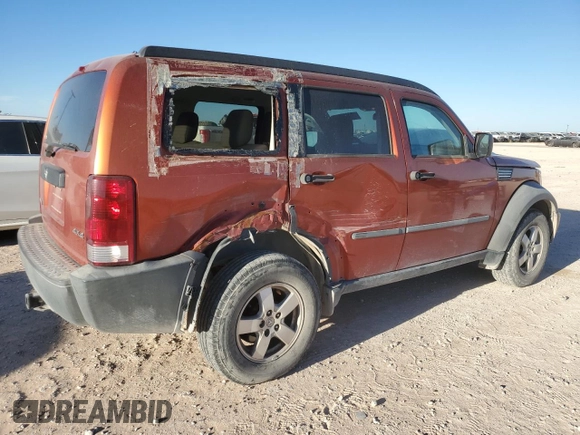 2007 Dodge Nitro SXT with VIN 1D8GU28K87W728744, listed as a Copart auction lot 77082954 with 245,632 mi miles and Salvage title. Bid and sale history available at DreamBid. Image 3.