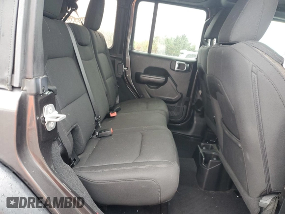 2018 Jeep Wrangler Unlimited Sport S с VIN 1C4HJXDG5JW171809, выставлен на аукционе Copart как лот 57834345 с пробегом 74 012 миль миль и Списание • Salvage title. История ставок и продаж доступна на DreamBid. Изображение 11.