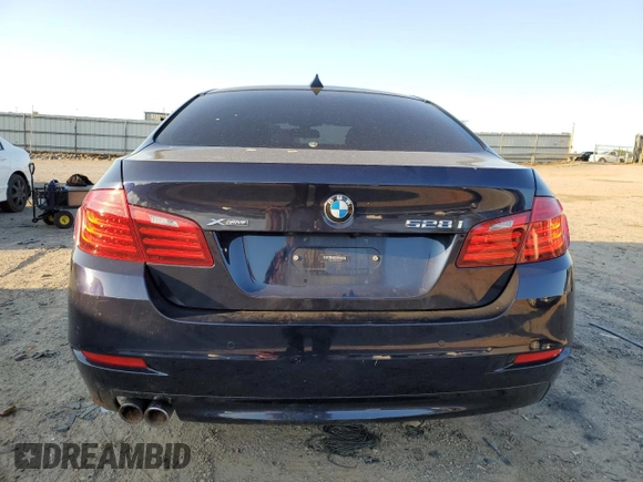 2015 BMW 5 Series 528i xDrive with VIN WBA5A7C58FG143147, listed as a Copart auction lot 52850195 with 130,528 mi miles and Salvage Title. Bid and sale history available at carsss.com. Image 6.