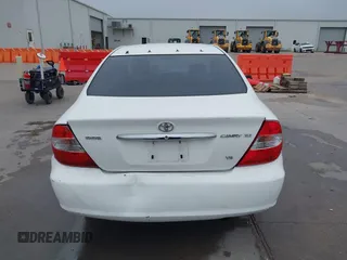 2003 Toyota Camry LE z VIN JTDBF30K530148403, wystawiony jako IAAI lot #41688346 z przebiegiem 299 143 mil mil oraz . Historia ofert i sprzedaży dostępna na DreamBid. Obrazek 16.