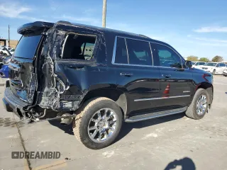 2019 GMC Yukon Denali with VIN 1GKS2CKJ9KR186604, listed as a Copart auction lot 82201124 with 110,069 mi miles and Salvage Title. Bid and sale history available at DreamBid. Image 3.