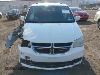 2019 Dodge Grand Caravan SXT with VIN 2C4RDGCG4KR771745, listed as a IAAI auction lot 41859267 with 97,436 mi miles and . Bid and sale history available at DreamBid. Image 12.
