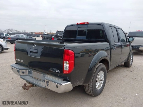 2018 Nissan Frontier SV V6 with VIN 1N6AD0ER5JN726258, listed as a IAAI auction lot 41434784 with 130,326 mi miles. Bid and sale history available at carsss.com. Image 4.