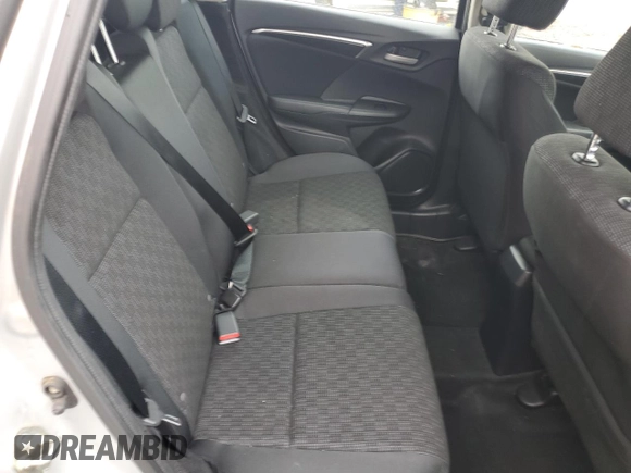 2015 Honda Fit LX z VIN 3HGGK5H58FM768130, wystawiony jako Copart lot #58184435 z przebiegiem 67 968 mil mil oraz Szkoda całkowita • Salvage title. Historia ofert i sprzedaży dostępna na DreamBid. Obrazek 10.