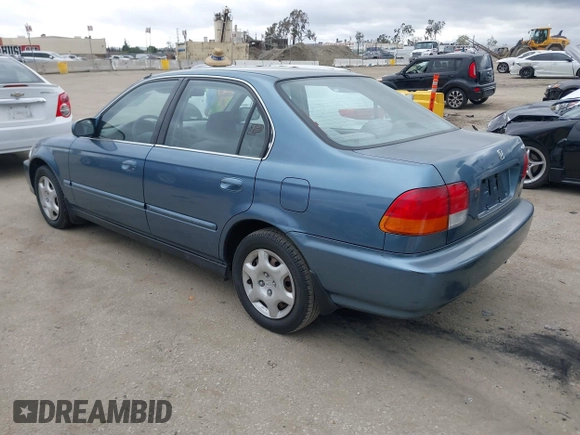 1998 Honda Civic EX with VIN JHMEJ8644WS002096, listed as a IAAI auction lot 41828342 with 184,283 mi miles. Bid and sale history available at carsss.com. Image 3.