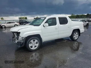2010 Honda Ridgeline RTL z VIN 5FPYK1F53AB006195, wystawiony jako Copart lot #52528435 z przebiegiem 205 522 mil mil oraz Szkoda całkowita • Salvage title. Historia ofert i sprzedaży dostępna na DreamBid. Obrazek 1.