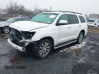 2016 Toyota Sequoia Limited with VIN 5TDJY5G18GS140071, listed as a IAAI auction lot 41570590 with 76,774 mi miles. Bid and sale history available at carsss.com. Image 2.