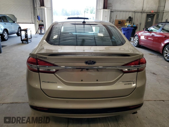 2017 Ford Fusion Hybrid Titanium with VIN 3FA6P0RU3HR360053, listed as a Copart auction lot 63063715 with 127,534 mi miles and Non repairable. Bid and sale history available at DreamBid. Image 6.