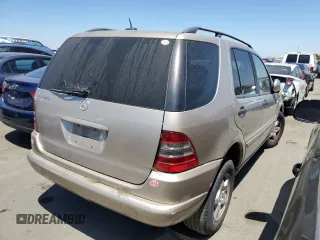 2001 Mercedes-Benz M-Class with VIN 4JGAB54EX1A259944, listed as a Copart auction lot 62058904 with 178,674 mi miles and Clean Title. Bid and sale history available at carsss.com. Image 3.