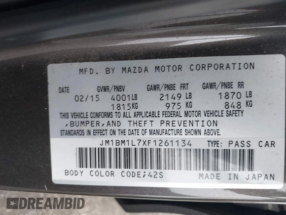2015 Mazda 3 i Touring with VIN JM1BM1L7XF1261134, listed as a IAAI auction lot 42164554 with 130,570 mi miles and . Bid and sale history available at DreamBid. Image 9.