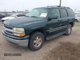 2002 Chevrolet Tahoe LT z VIN 1GNEC13ZX2R279380, wystawiony jako IAAI lot #42324646 z przebiegiem 188 781 mil mil oraz . Historia ofert i sprzedaży dostępna na DreamBid. Obrazek 2.