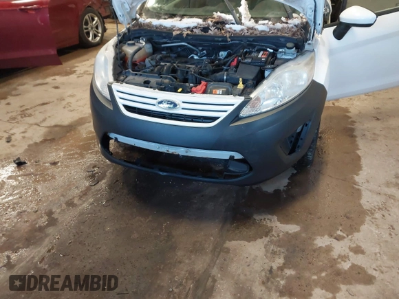 2012 Ford Fiesta S with VIN 3FADP4AJ9CM140647, listed as a IAAI auction lot 41633251 with 117,309 mi miles. Bid and sale history available at carsss.com. Image 6.