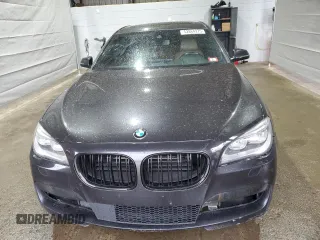 2015 BMW 7 Series 750Li xDrive z VIN WBAYF8C57FD653916, wystawiony jako Copart lot #52864275 z przebiegiem 138 811 mil mil oraz Szkoda całkowita • Salvage title. Historia ofert i sprzedaży dostępna na DreamBid. Obrazek 5.