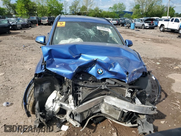 2017 BMW X1 xDrive28i with VIN WBXHT3C32H5F81460, listed as a Copart auction lot 55998515 with 123,853 mi miles and Salvage title. Bid and sale history available at DreamBid. Image 5.