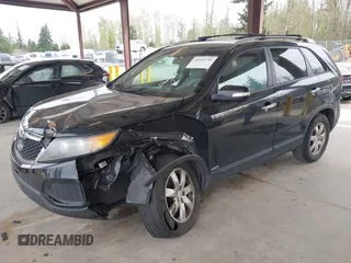 2011 Kia Sorento LX with VIN 5XYKTDA24BG170561, listed as a IAAI auction lot 42011756 with 211,833 mi miles. Bid and sale history available at carsss.com. Image 17.