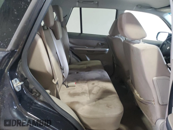 2009 Suzuki Grand Vitara with VIN JS3TE042694100010, listed as a Copart auction lot 56716225 with 148,495 mi miles and Salvage title. Bid and sale history available at DreamBid. Image 11.