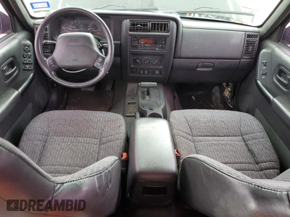 2000 Jeep Cherokee with VIN 1J4FT48S3YL139915, listed as a Copart auction lot 69840924 with 249,720 mi miles and Salvage title. Bid and sale history available at DreamBid. Image 8.