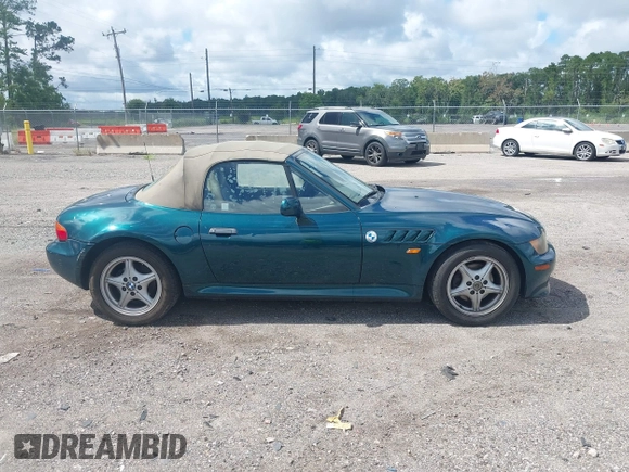1999 BMW Z3 2.5 with VIN 4USCH9336XLF81090, listed as a IAAI auction lot 42742278 with 164,341 mi miles and . Bid and sale history available at DreamBid. Image 13.