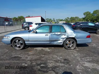 1997 Mercury Grand Marquis LS with VIN 2MELM75W7VX708034, listed as a IAAI auction lot 41878938 with 197,818 mi miles and . Bid and sale history available at DreamBid. Image 14.